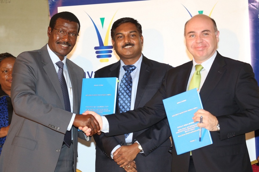 Kenya Power  MD & CEO, Dr. Ben Chumo (left),  Nelish Pimpalker (center) and Fernando Pablo of AEE Power (Spain)